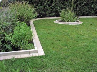 real stone Arcadian lawn edging by Haddonstone