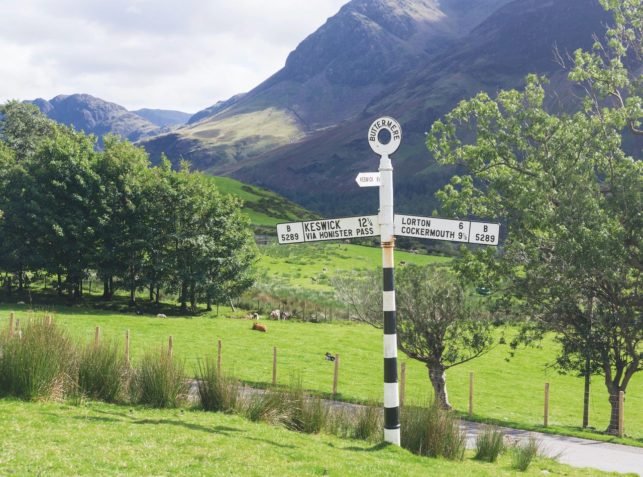 Old signpost near Wrynose Pass in Lake District, Cumbria, England, UK