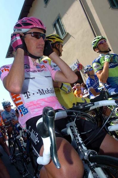 Pino adjusts his helmet.