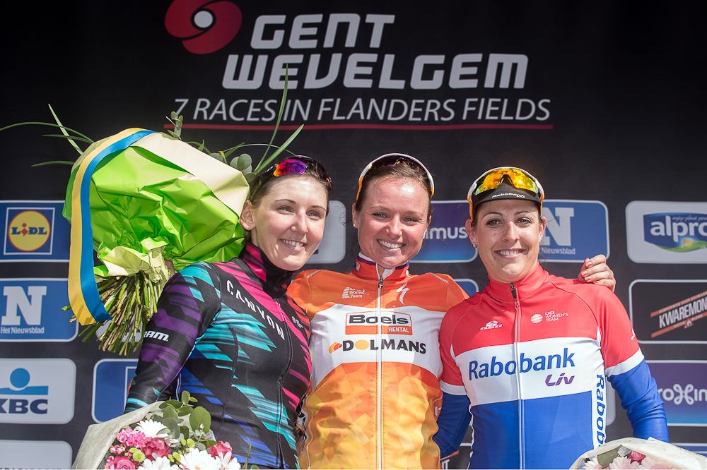Lisa Brennauer, Chantal Blaak and Lucinda Brand celebrate on the podium at the end of Gent-Wevelgem