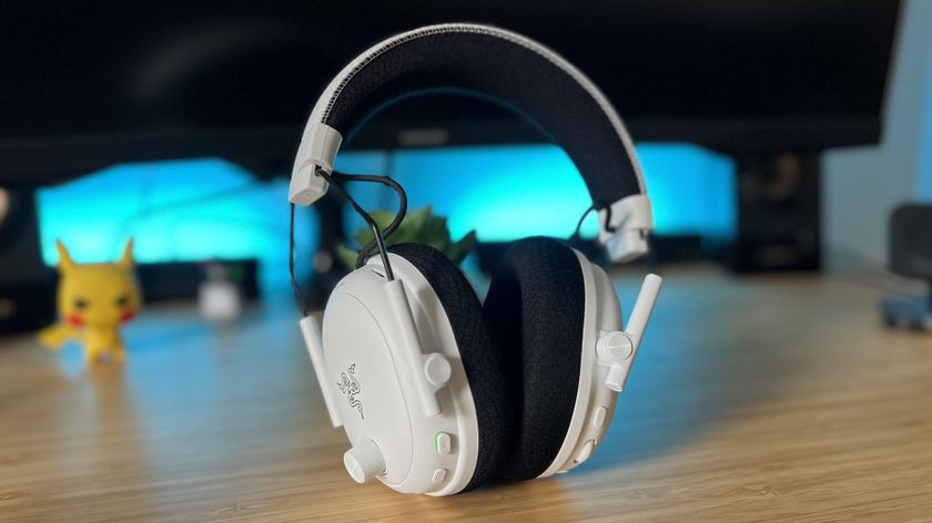 Razer BlackShark V3 Pro gaming headset on a wooden desk