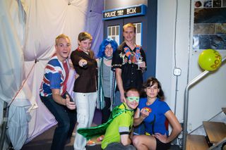 The HI-SEAS crew poses with the TARDIS. The crew includes: Martha Lenio (Commander), Jocelyn Dunn (Chief Scientist), Sophie Milam (Executive Officer), Allen Mirkadyrov (Crew Engineer), Neil Scheibelhut (Medical Officer), and Zak Wilson (Chief Engineer).