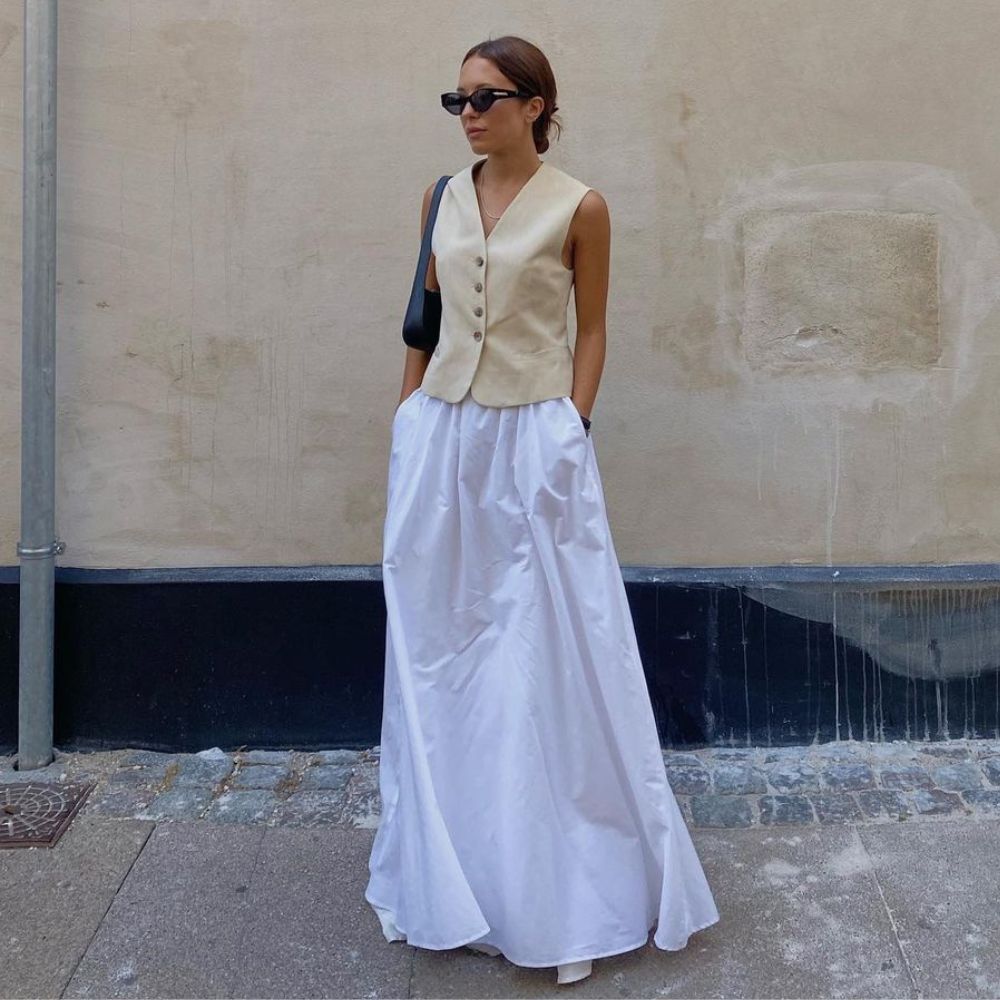 Fashion People Keep Wearing Waistcoats With Full Skirts | Who What Wear