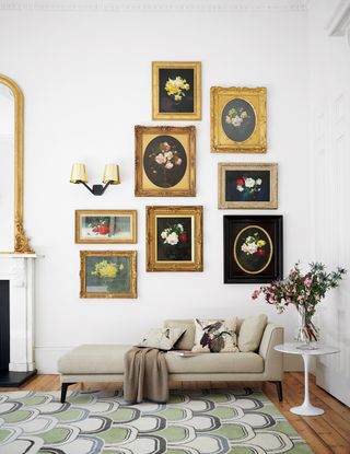 Small gallery wall in a white living room