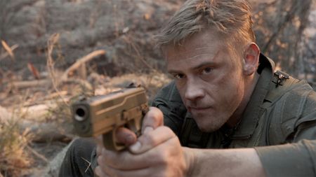 An image of Boyd Holbrook in The Predator