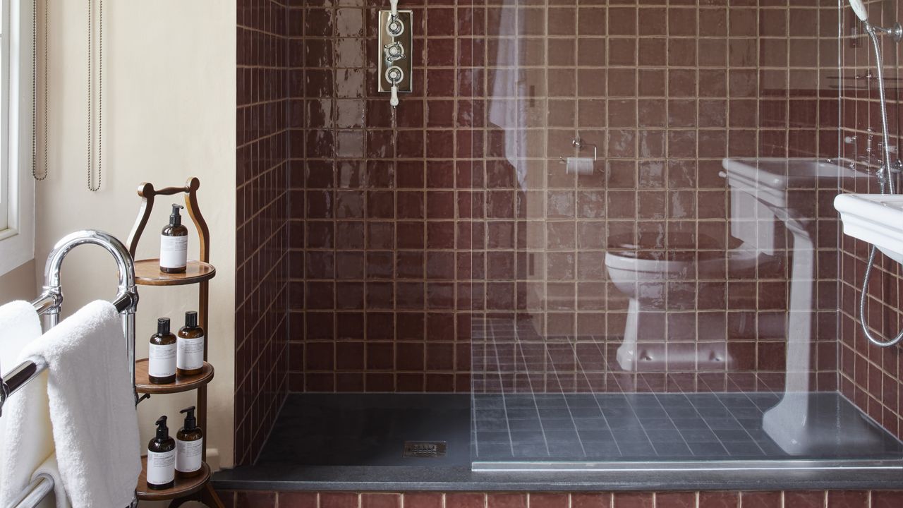 Dark brown tiled bathroom