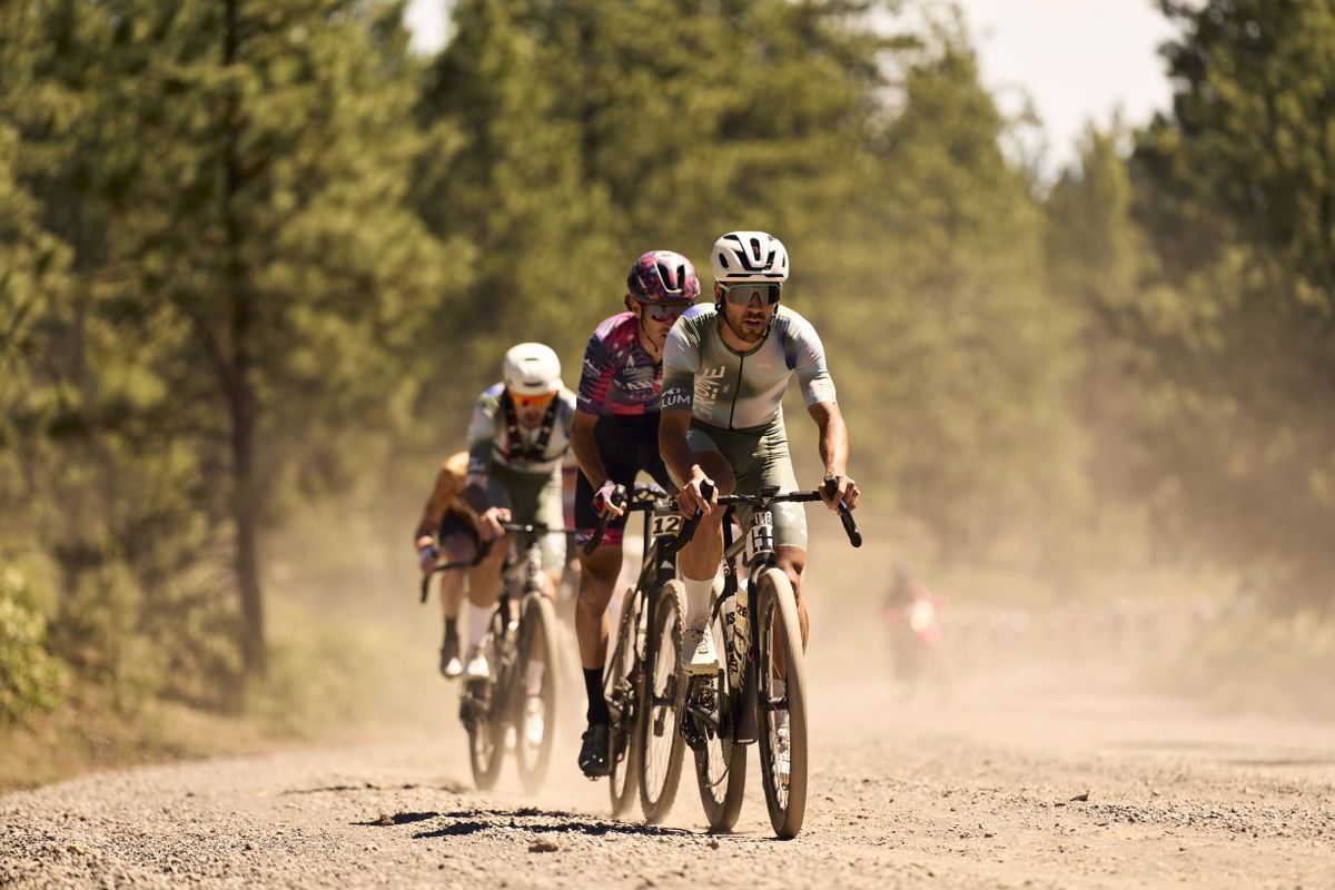 Hugo Drechau rides in front of Peter Stetina on stage 1