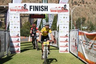 Melissa Anset crosses the line to win stage 3 of the Ingkerreke Commercial MTB Enduro