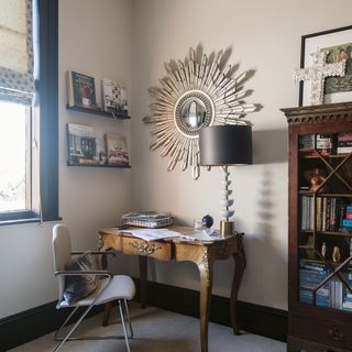 guest bedroom with shelves on white wall