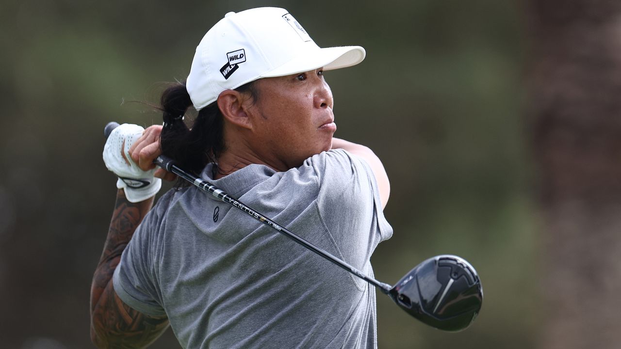 Anthony Kim hits a drive