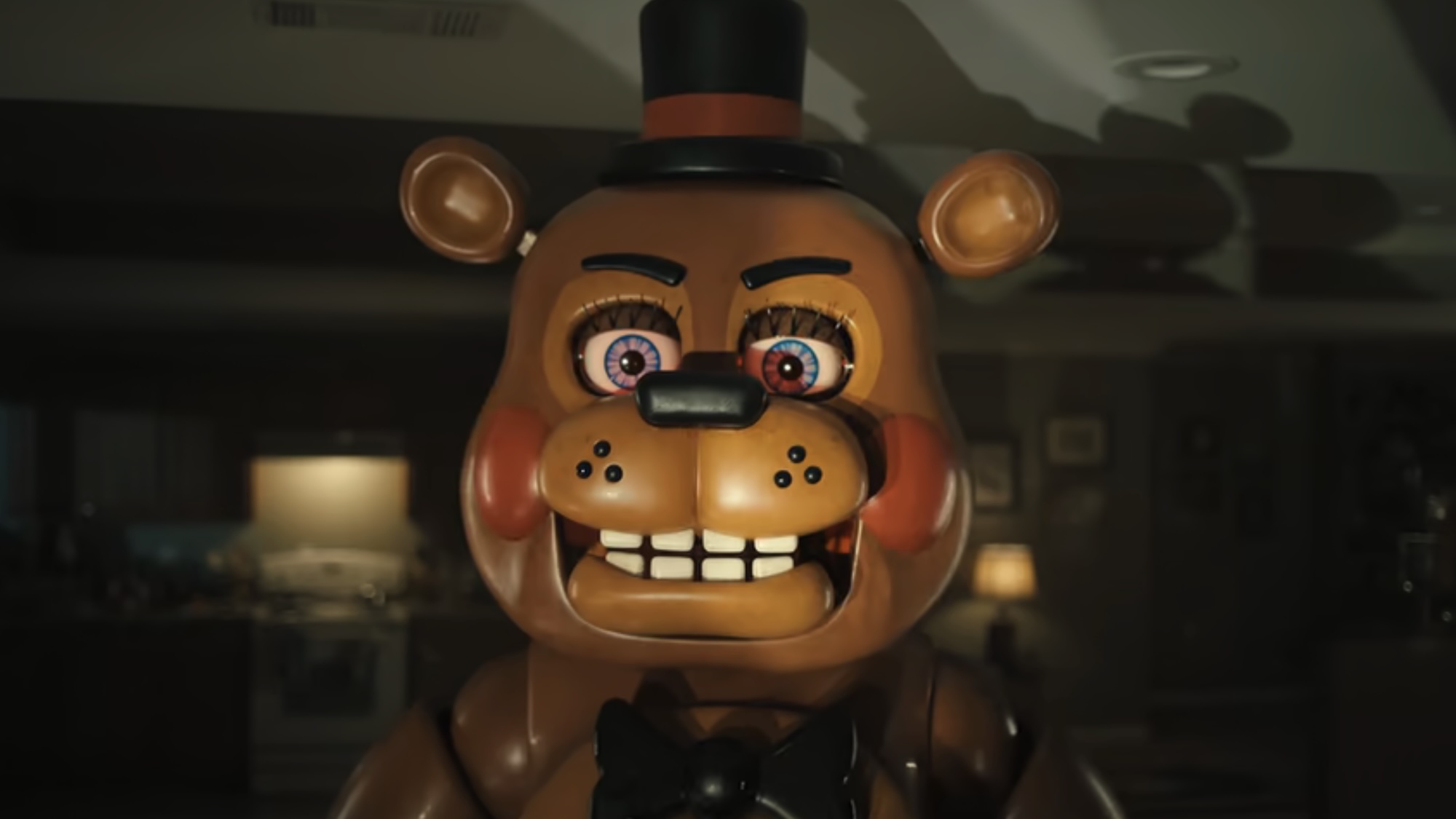 Close-up of Freddy Fazbear with flashlight in face in Five Nights at Freddy's 2