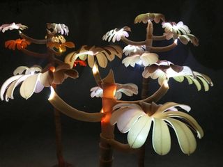 Marting created interactive sculptures based on his research. The movement of the lights within the trunk mimics the activity of ants within a particular colony, reflecting that colony's personality.