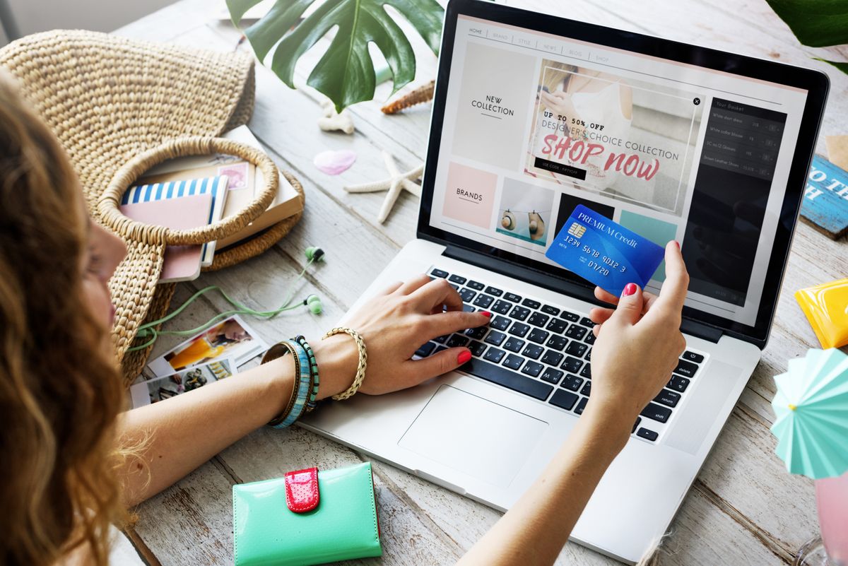 Woman shopping online on a laptop