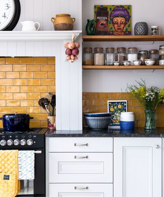 Kitchen with yellow tile splashback