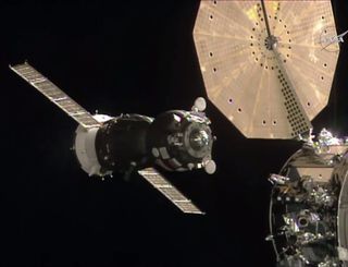 The Russian Soyuz TMA-19M spacecraft carrying NASA astronaut Tim Kopra, British astronaut Tim Peake and Russian cosmonaut Yuri Malenchenko is seen on docking approach to the International Space Station on Dec. 15, 2015. 
