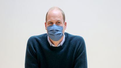 Prince William wearing a face mask