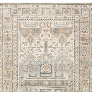 Nicolette Hand Knotted Wool Rug against a white background. 