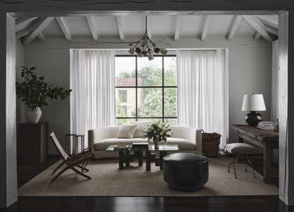 A living room with several lighting pieces 