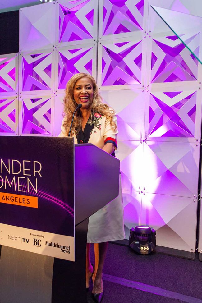 Honoree Ayo Davis, president of Disney Branded Television, on stage at the Sofitel Los Angeles in Beverly Hills.