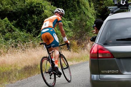 Blake Hose (Genesys Wealth Advisers) gets advice from the team car after being dropped early on the first climb of the day.
