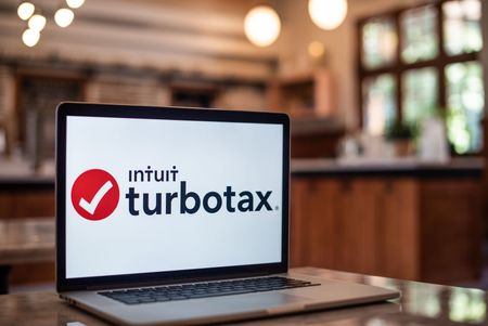 Laptop with TurboTax logo displayed.