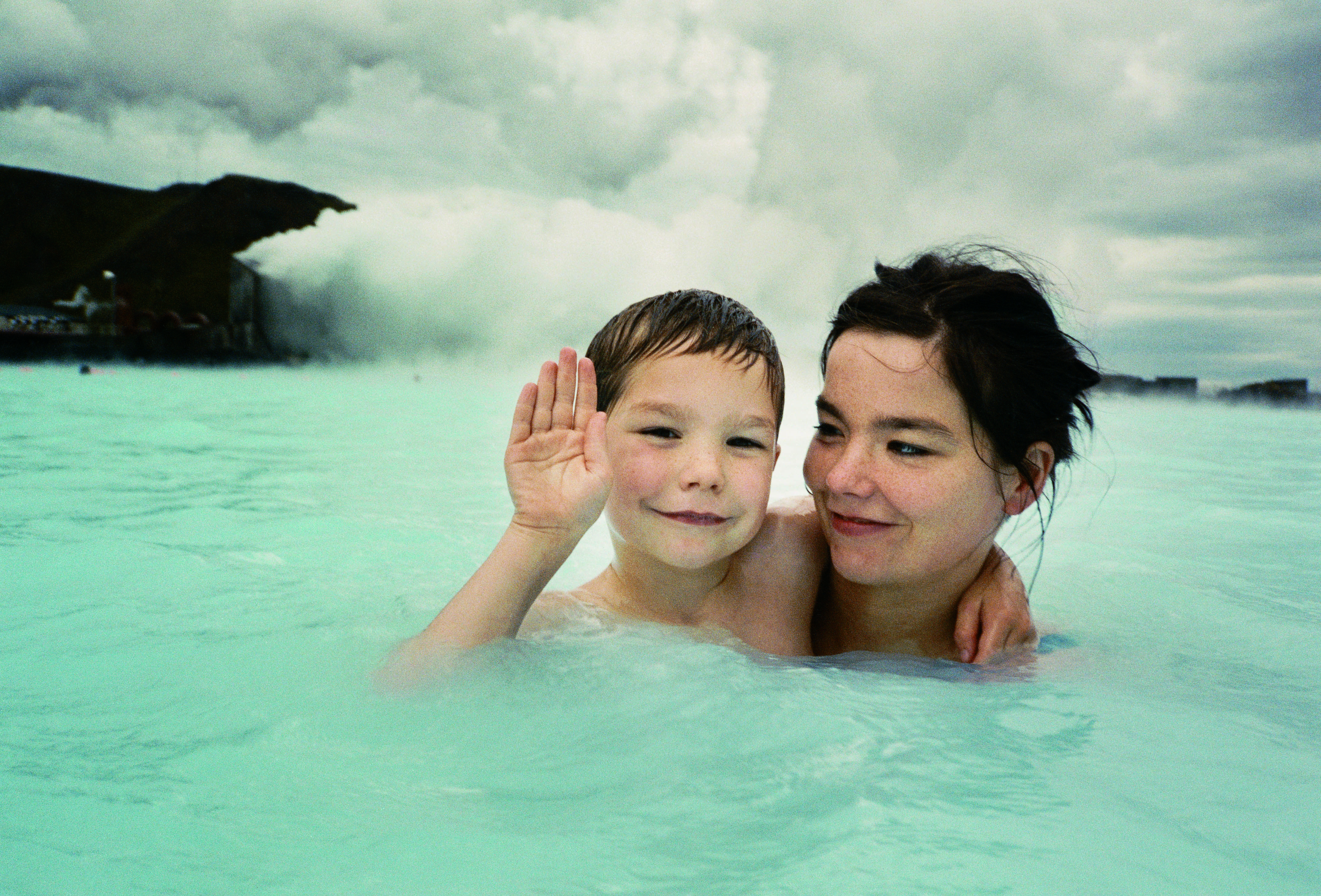 Björk and son in thermal pool