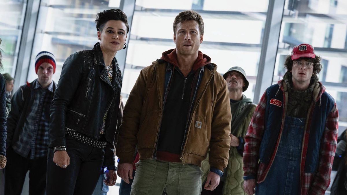 Glen Powell, Katy O'Brian, and Martin Herlihy in The Running Man