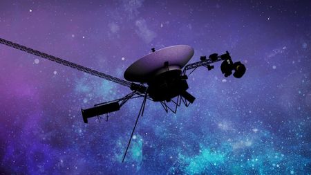A small space probe floating above a purple and blue starry background