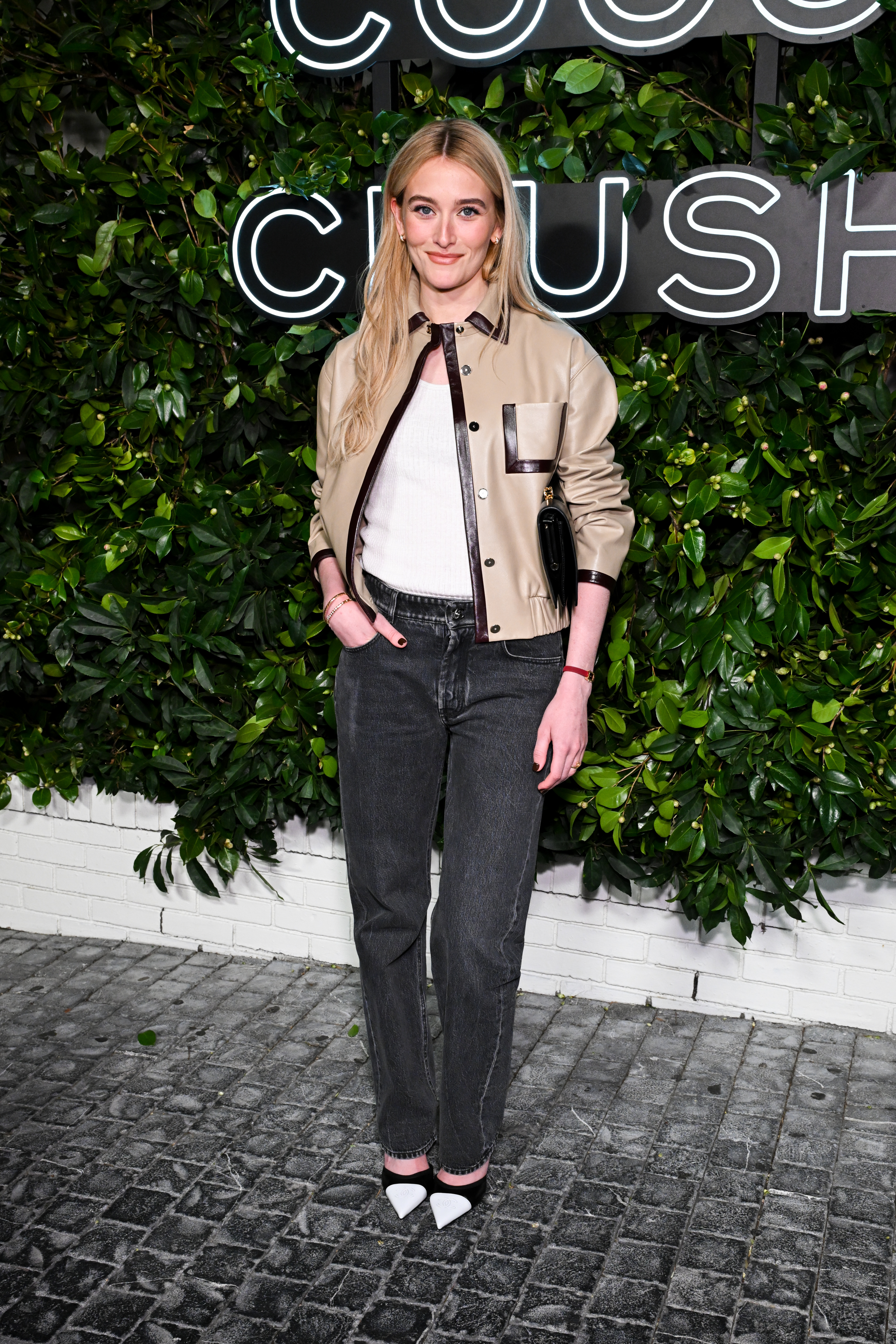 Sarah Pidgeon attended a Chanel brand event in black jeans, a leather coat, and cap-toe pumps