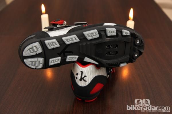 Fi'zi:k's new M5 mountain bike shoe features a grooved nylon sole and an aggressive wraparound tread.