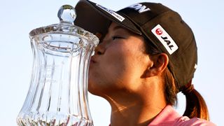 Nasa Hataoka kisses the trophy after winning the 2022 DIO Implant LA Open at Palo Verdes Golf Club