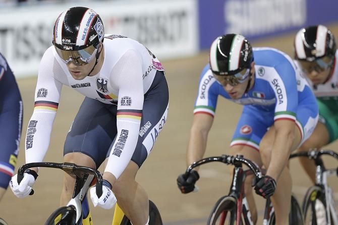 Max Levy (Germany) rides in the keirin heats