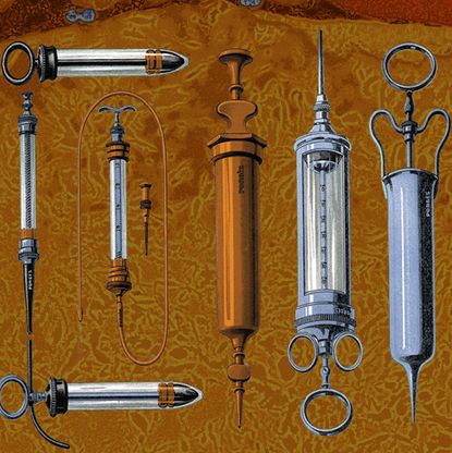 woman's shoulders surrounded by surgery instruments