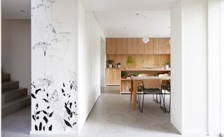 Inside, the architects opted for a serene, yet sharp and contemporary interior is light colours and natural materials