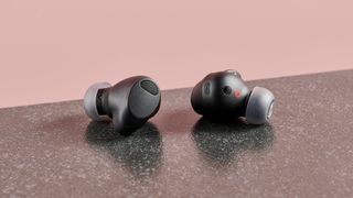 LG Tone Free T90S earbuds on counter