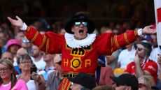 An England fan in a Beefeater costume in the stands during the second Ashes series Test match between Australia and England at The Gabba, Brisbane