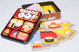 best card games: a box of the game Sushi Go with some cards lying next to it