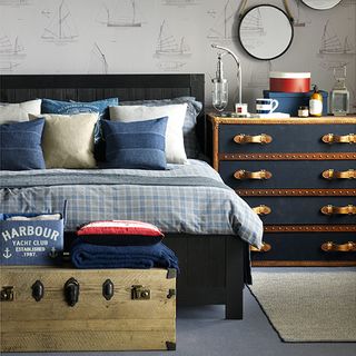 bedroom with boat painted wall