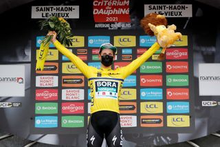 SAINT HAON LE VIEUXON FRANCE JUNE 01 Lukas Pstlberger of Austria and Team Bora Hansgrohe yellow leader jersey celebrates at podium during the 73rd Critrium du Dauphin 2021 Stage 3 a 1722km stage from Langeac to Saint Haon Le Vieuxon Covid safety measures Mascot UCIworldtour Dauphin dauphine June 01 2021 in Saint Haon Le Vieuxon France Photo by Bas CzerwinskiGetty Images