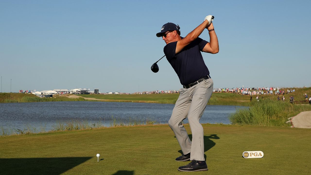 Phil Mickelson hits a tee shot at the 2021 PGA Championship