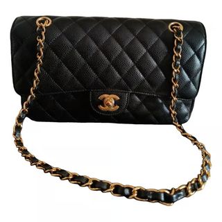 Chanel 2.55 in black and gold, second hand