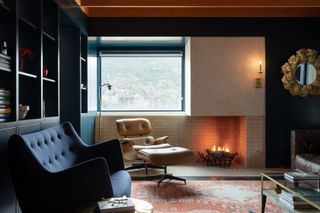 living room with orange rug