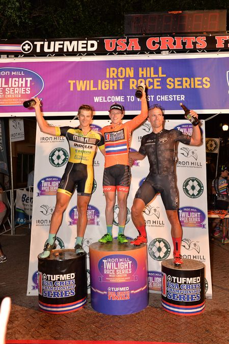 Ryan Aitcheson atop the USA Crits series podium