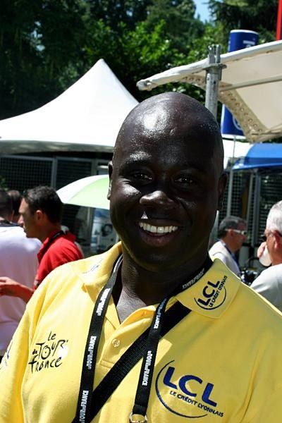 This is the guy who sits on the back of the bike with the chalkboard, scribbling down time gaps between the break and the peloton.