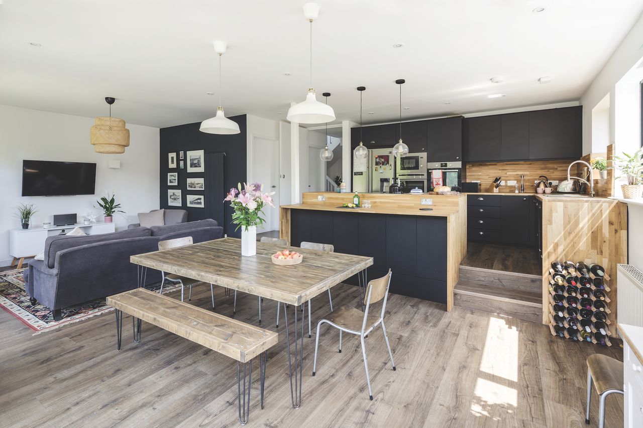 Previously the kitchen didn&rsquo;t connect to the garden: it was at the front of the bungalow and the lounge was at the other end. The family wanted a more sociable space, so they brought these together to create an open-plan kitchen and dining area.