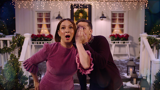 Andy Samberg whispers in Maya Rudolph's ear on Baking It.