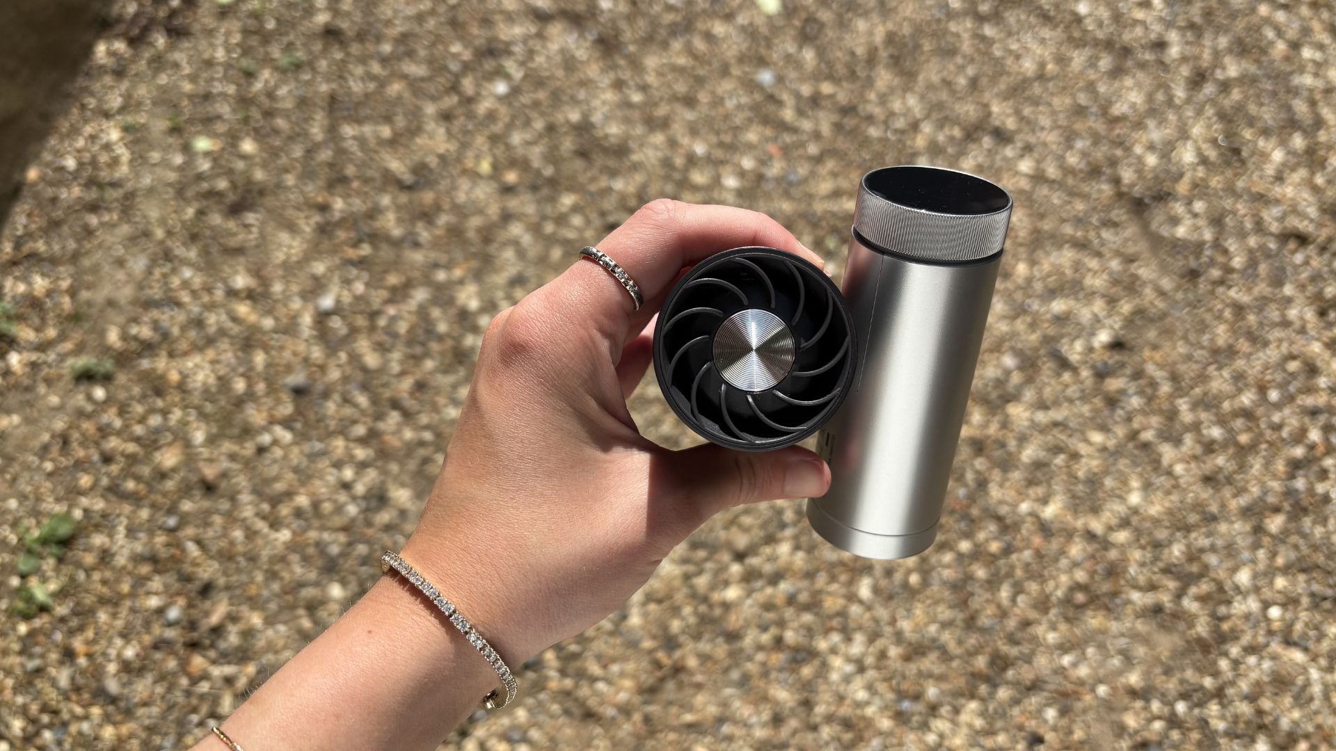 Shark ChillPill 3-in-1 Fan, Mist &amp;amp; InstaChill System being tested outside with the fan