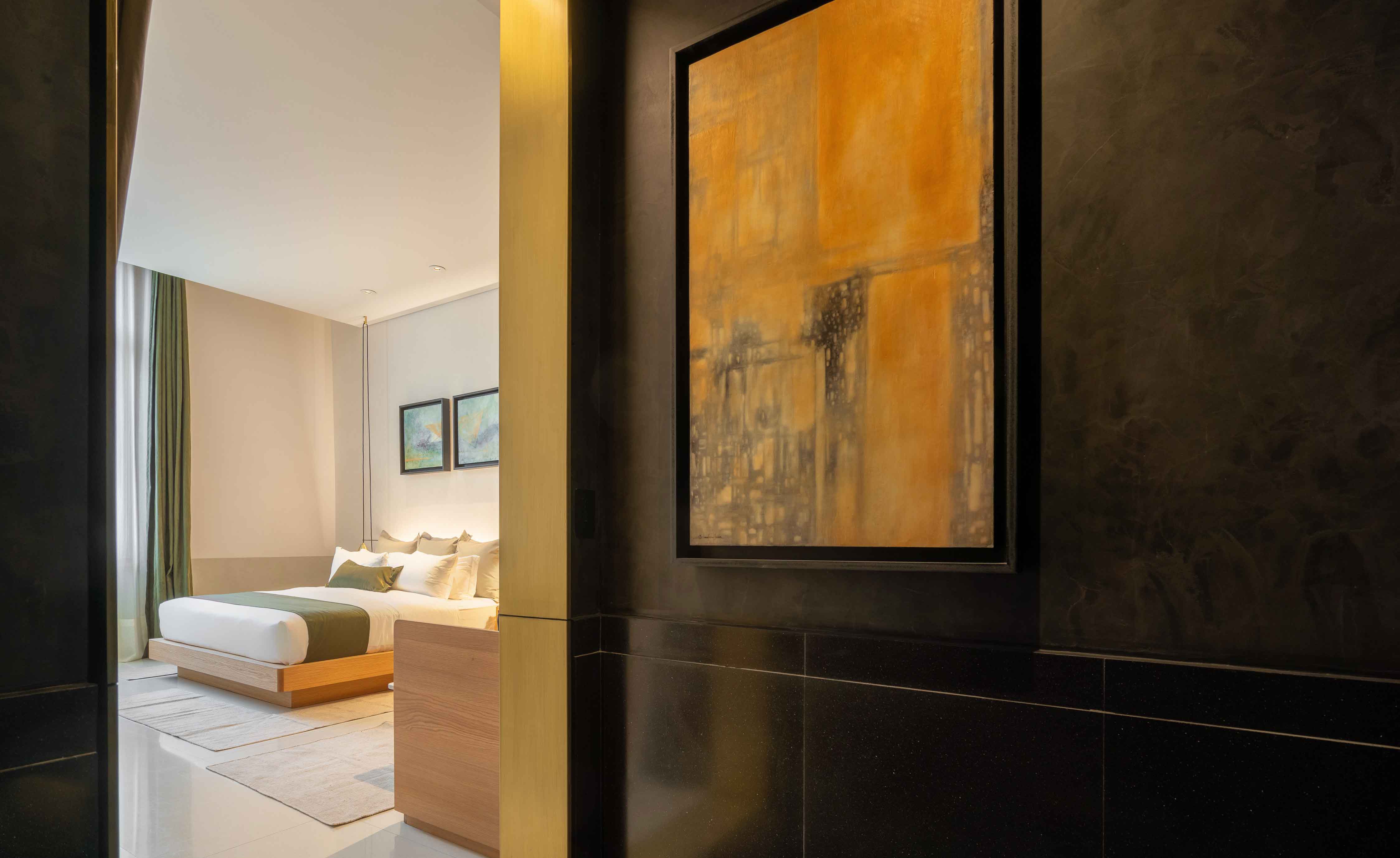 Entrance to bedroom with large picture frame