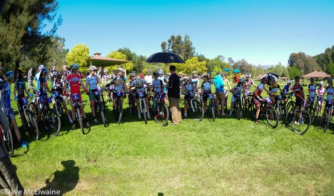 The women tried to stay in the shade before the start as temperatures were rising