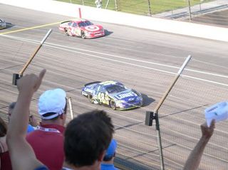 Jimmie Johnson surges forward one more time during the final laps of the 2006 Brickyard 400.